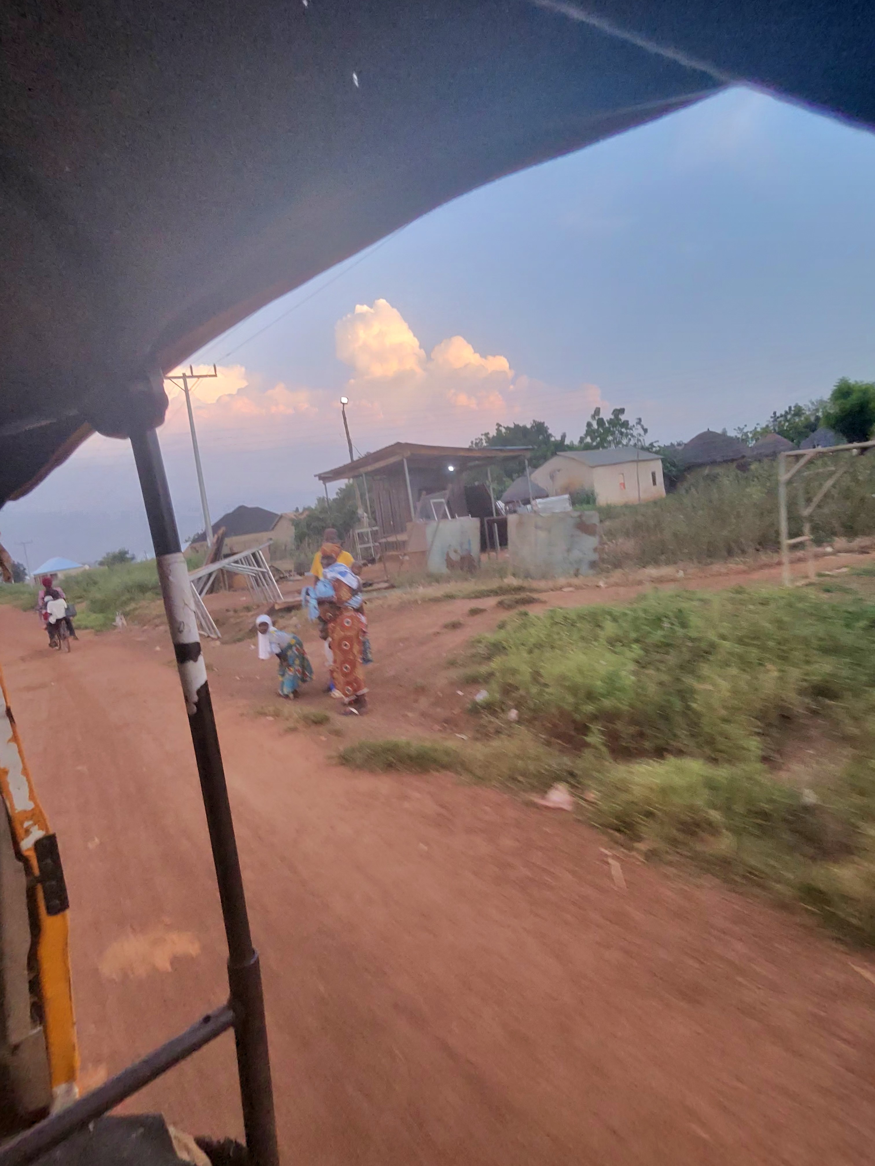Sunset over a road in Ghana
